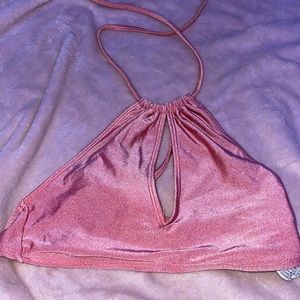 A pink bathing suit top